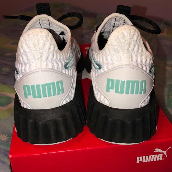 puma defy mid varsity white